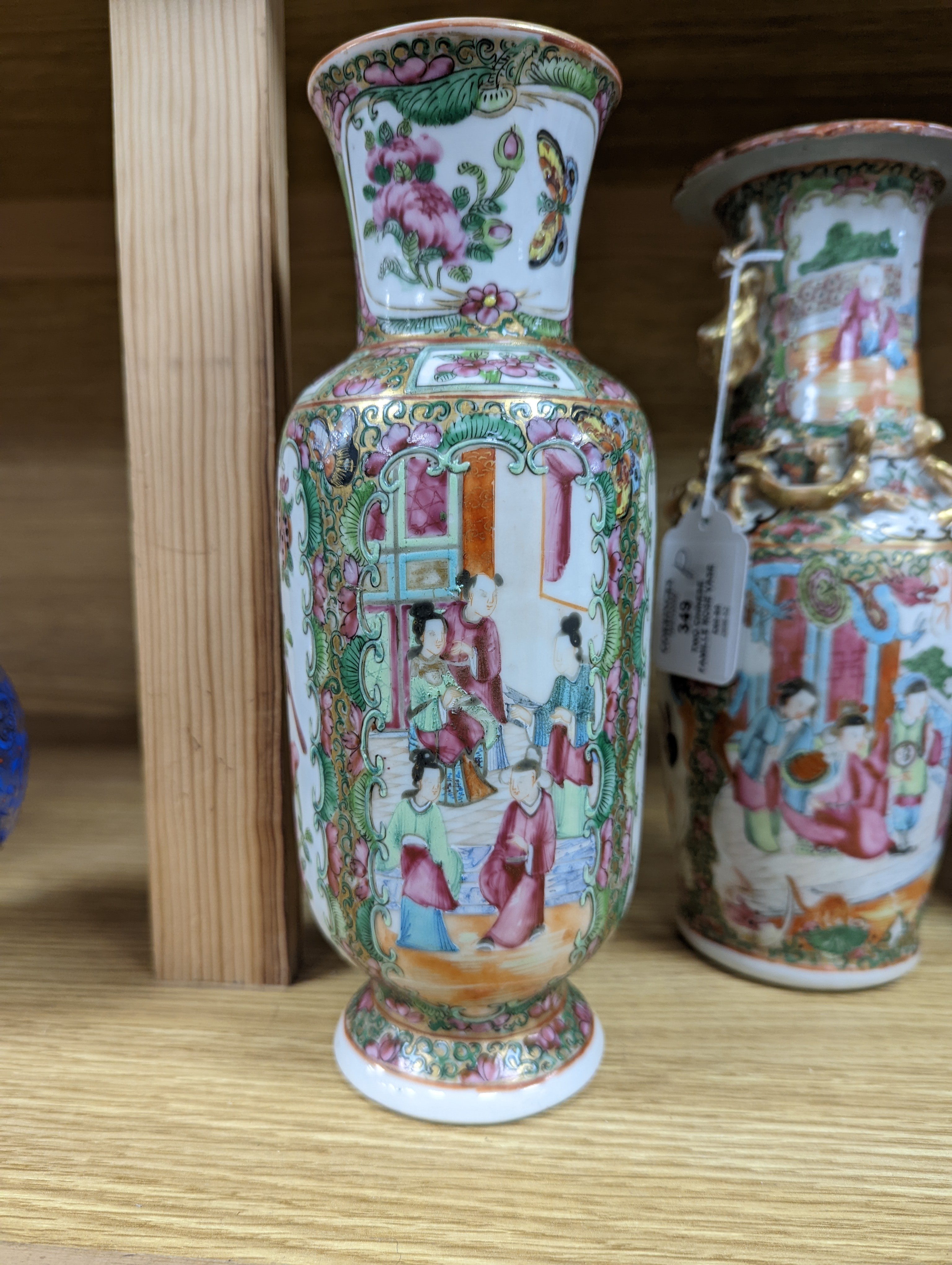 Two Chinese famille rose vases, late 19th century, tallest 26 cm, one wood stand, some restoration